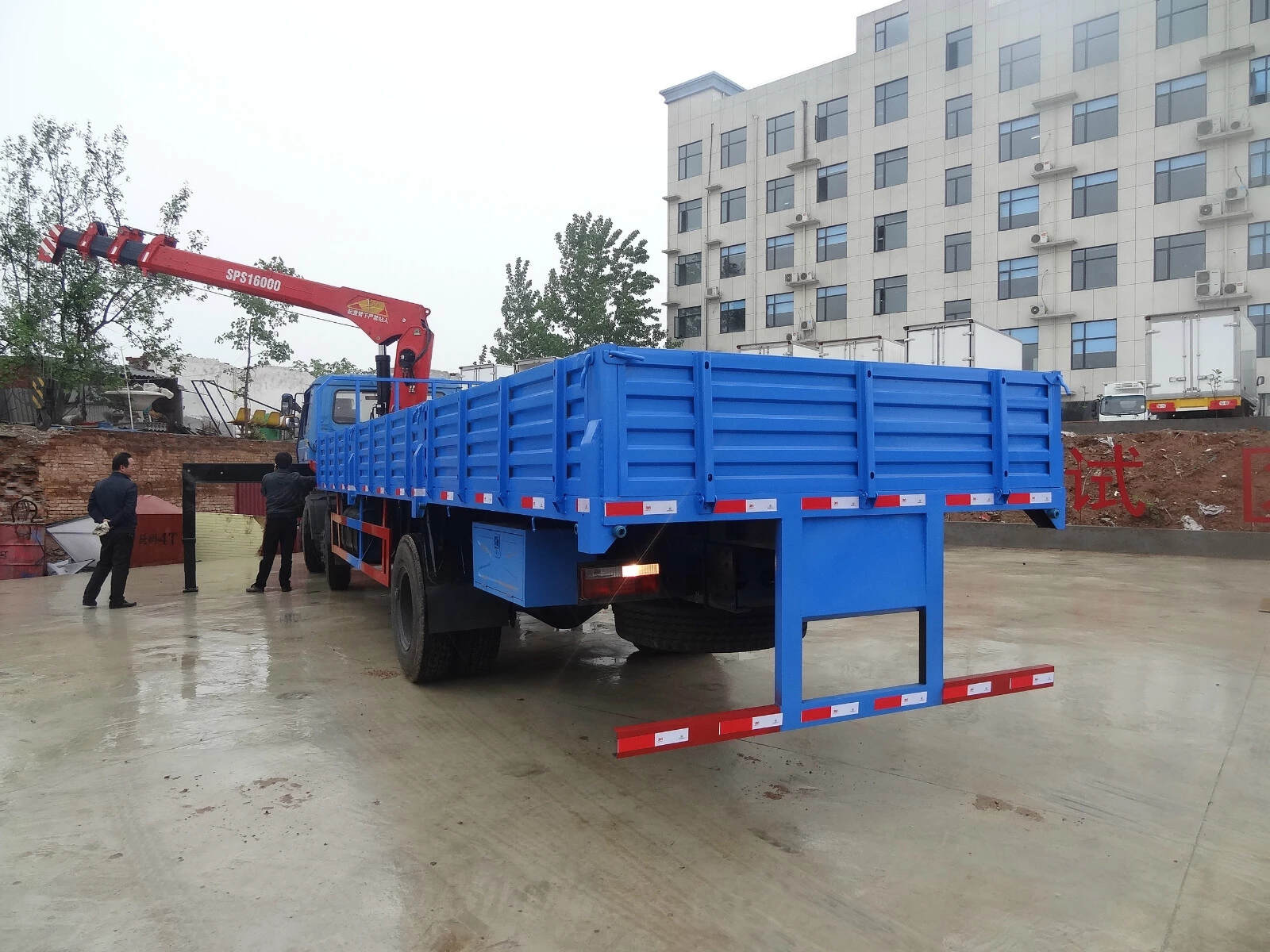 flatbed with crane truck