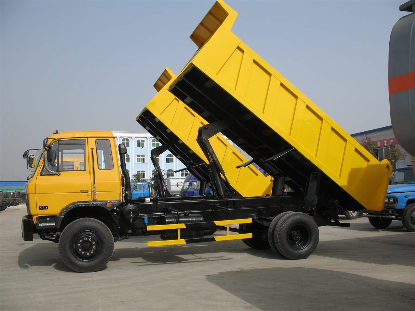 front loading dumper truck, fungsi dump truck